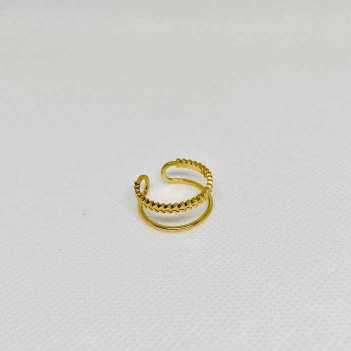 ANILLO DOBLE IRREGULAR ACERO BAÑADO EN ORO