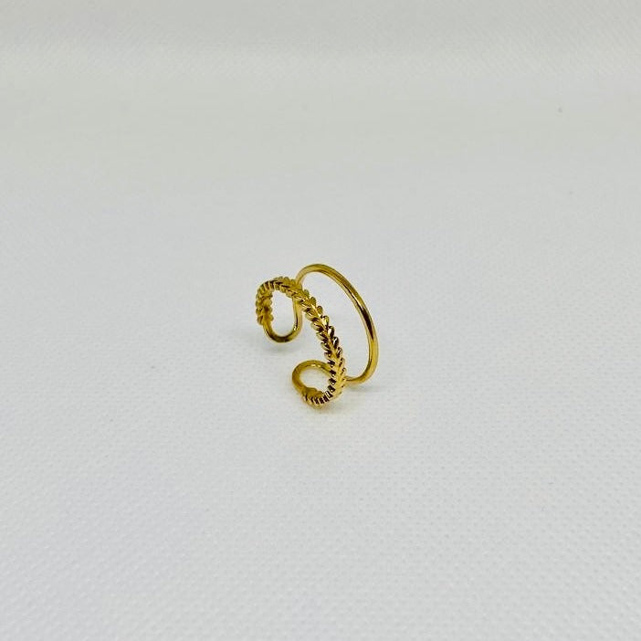 ANILLO DOBLE IRREGULAR ACERO BAÑADO EN ORO