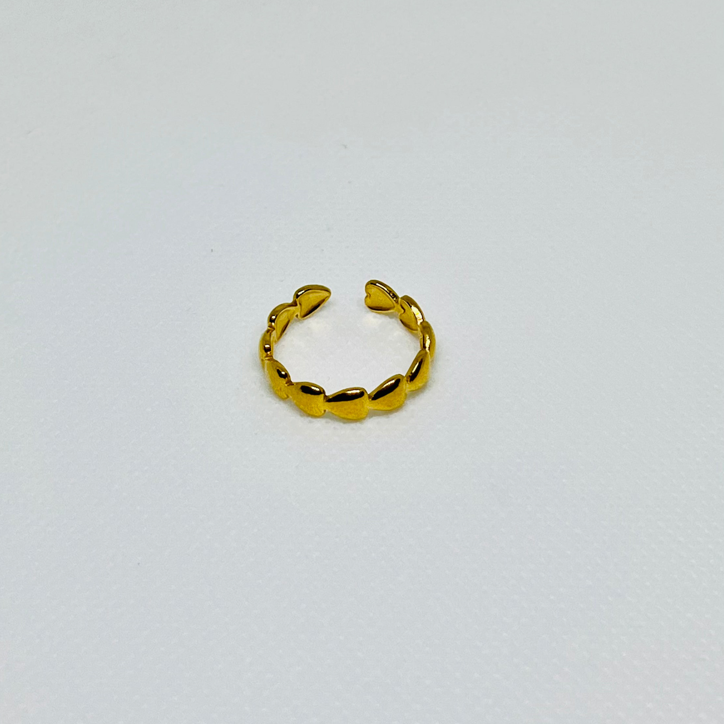 ANILLO CORAZONES ACERO BAÑDO EN ORO